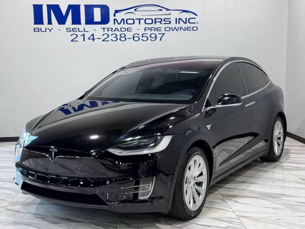 Tesla Model X with VIN: 5YJXCAE25JF128324