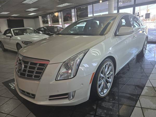 Cadillac XTS with VIN: 2G61M5S39E9142909