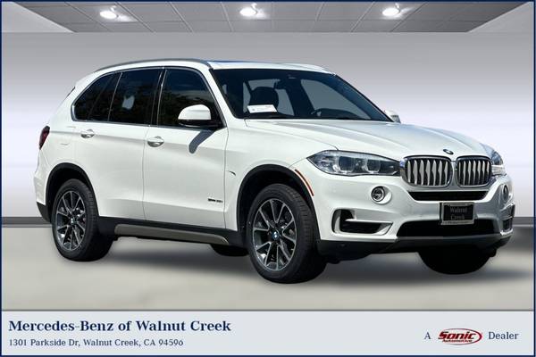 BMW X5 with VIN: 5UXKR2C51H0U18921