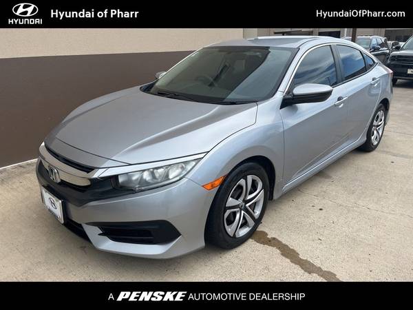 Honda Civic with VIN: 19XFC2F58JE026192
