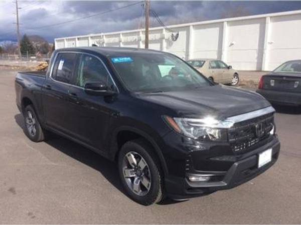 Honda Ridgeline with VIN: 5FPYK3F5XRB002295