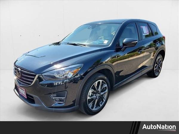 Mazda CX-5 with VIN: JM3KE4DY8G0674089