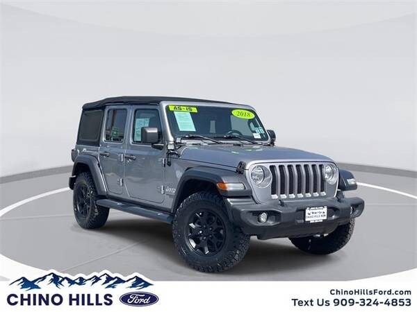 Jeep Wrangler with VIN: 1C4HJXDG9JW151045
