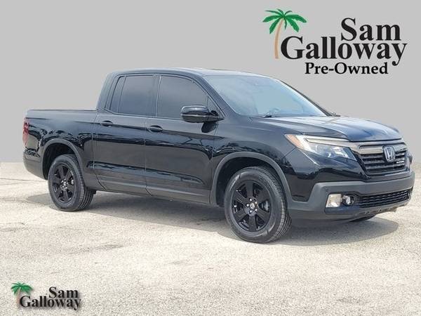 Honda Ridgeline with VIN: 5FPYK3F88JB000253