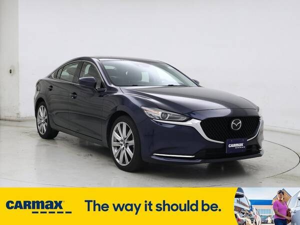 Mazda 6 with VIN: JM1GL1WY4M1612937