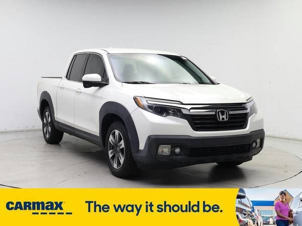 Honda Ridgeline with VIN: 5FPYK2F68HB001079