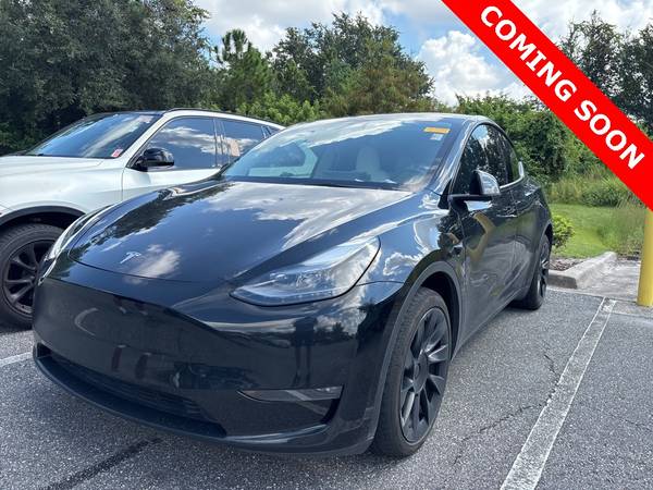 Tesla Model Y with VIN: 7SAYGDEEXPF794871