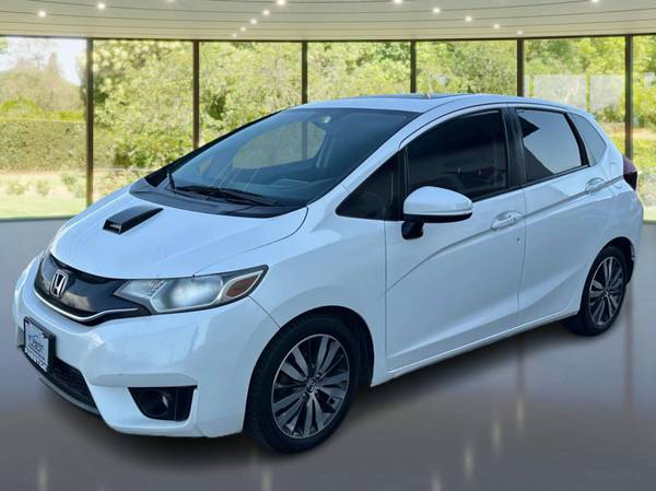 Honda Fit with VIN: JHMGK5H71GX030003