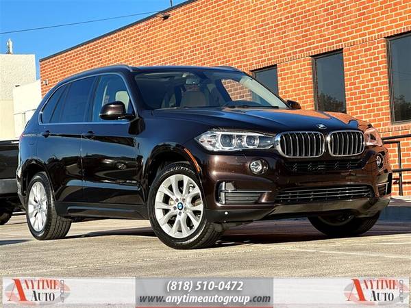 BMW X5 with VIN: 5UXKR0C54F0K57952