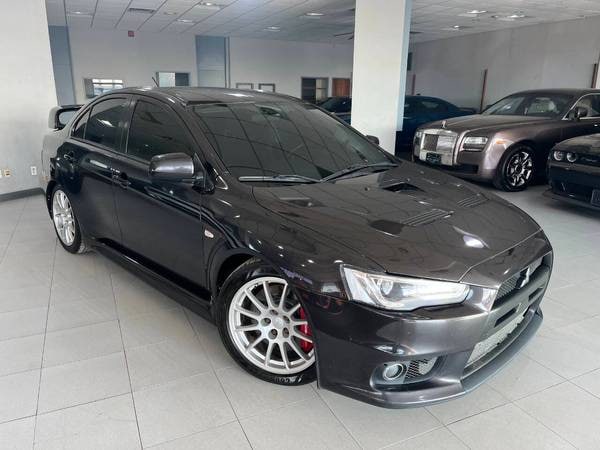 Mitsubishi Lancer Evolution with VIN: JA32W8FV5EU005864