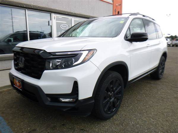Honda Passport with VIN: 5FNYF8H04NB009393