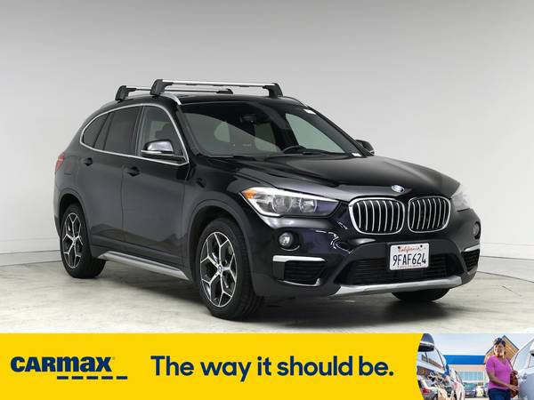 BMW X1 with VIN: WBXHU7C31J5L06458