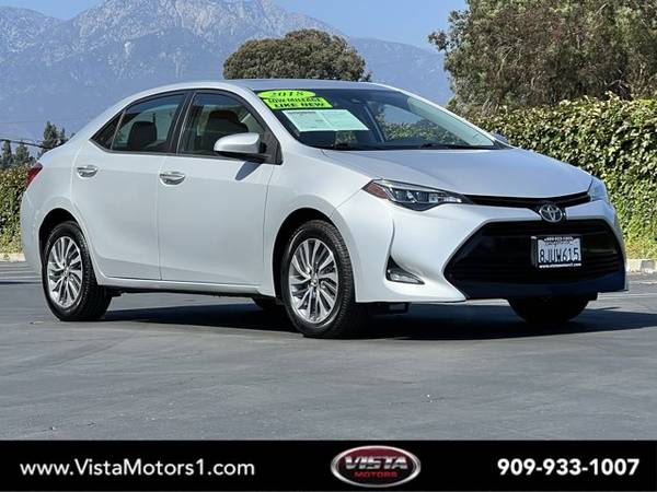 Toyota Corolla with VIN: 5YFBURHE3JP799586