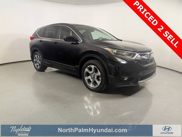 Honda CR-V with VIN: 7FARW1H56HE005331