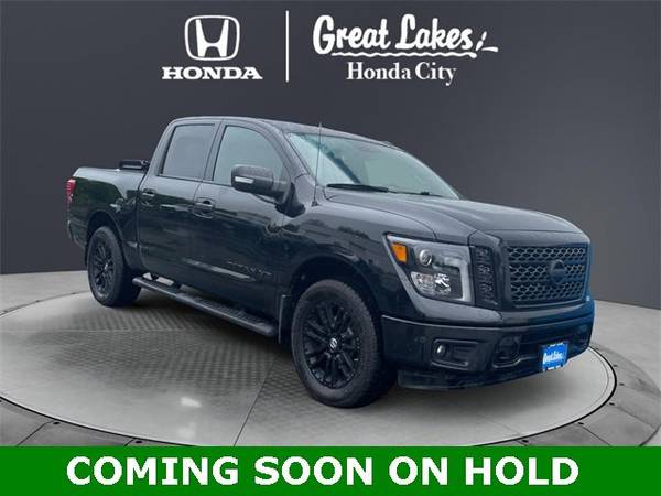 Nissan Titan with VIN: 1N6AA1E52KN509098