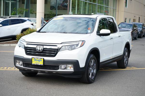 Honda Ridgeline with VIN: 5FPYK3F70LB000869