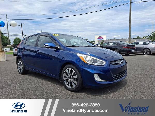 Hyundai Accent with VIN: KMHCU5AE3FU211974