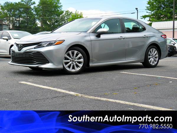 Toyota Camry with VIN: 4T1B11HK9JU635869