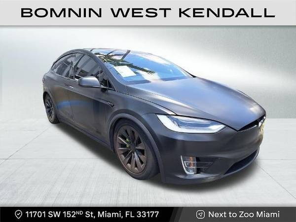 Tesla Model X with VIN: 5YJXCAE24HF042142