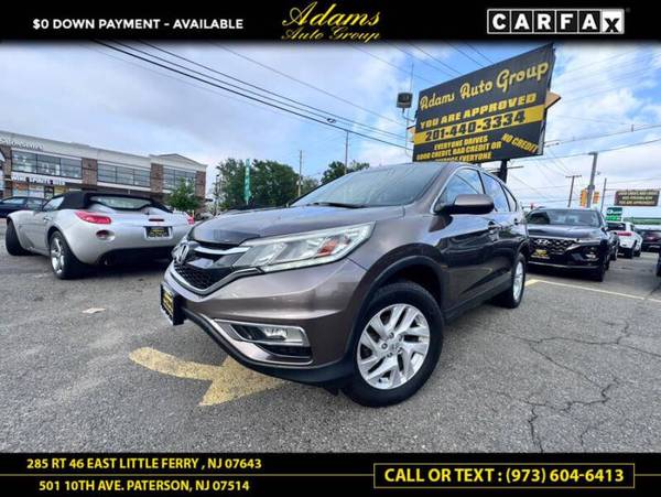 Honda CR-V with VIN: 2HKRM4H57GH664389