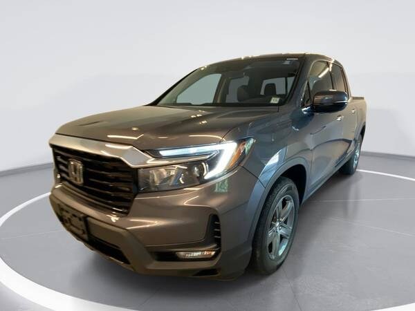Honda Ridgeline with VIN: 5FPYK3F72PB003357