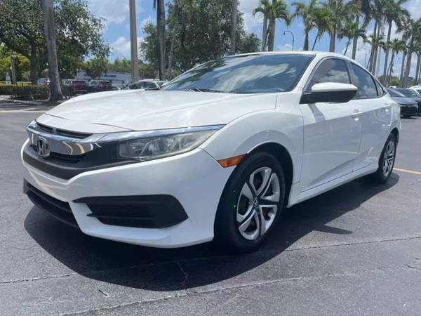 Honda Civic with VIN: 19XFC2F58JE040836