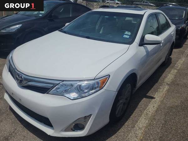 Toyota Camry with VIN: 4T4BF1FK2ER425632