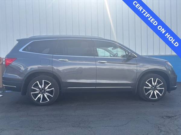 Honda Pilot with VIN: 5FNYF6H06NB059068