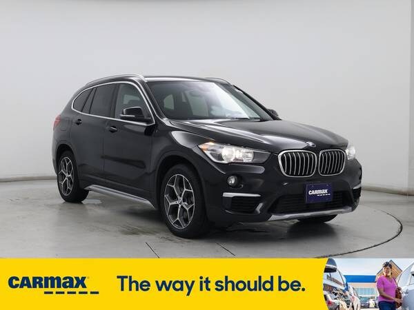BMW X1 with VIN: WBXHT3C51K3H36424