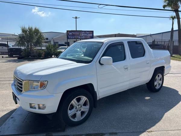 Honda Ridgeline with VIN: 5FPYK1F59EB005915