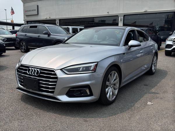 Audi A5 with VIN: WAUCNCF59JA018282