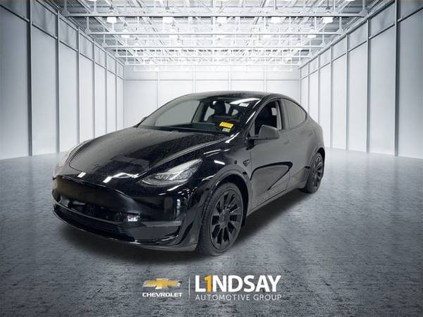 Tesla Model Y with VIN: 5YJYGDEE1LF040054