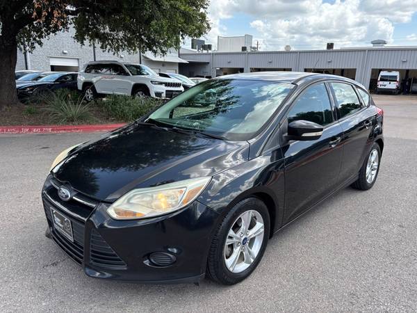 Ford Focus with VIN: 1FADP3K20EL225348