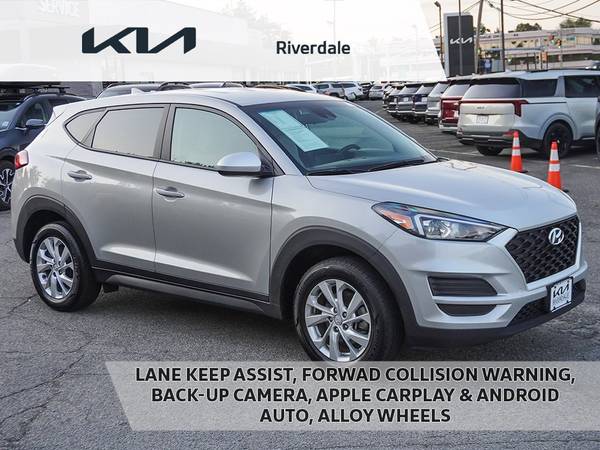 Hyundai Tucson with VIN: KM8J2CA41MU394023