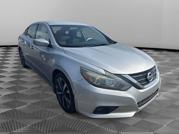 Nissan Altima with VIN: 1N4AL3APXGC119004