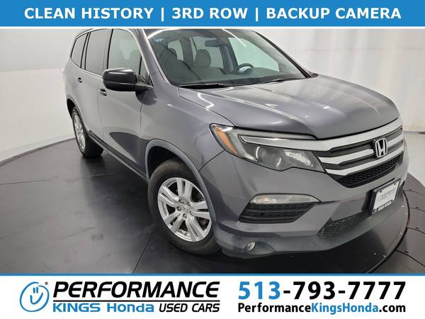Honda Pilot with VIN: 5FNYF5H13GB025093