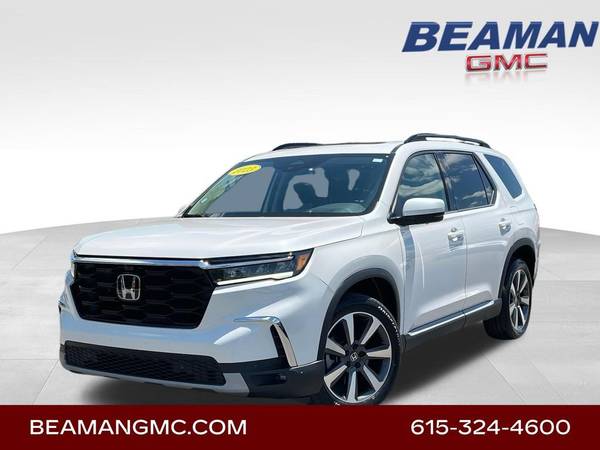 Honda Pilot with VIN: 5FNYG1H81PB039268