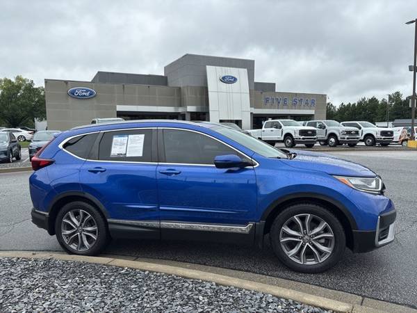 Honda CR-V with VIN: 7FARW1H99ME011010