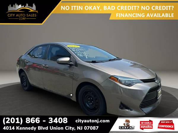 Toyota Corolla with VIN: 2T1BURHE2HC911594