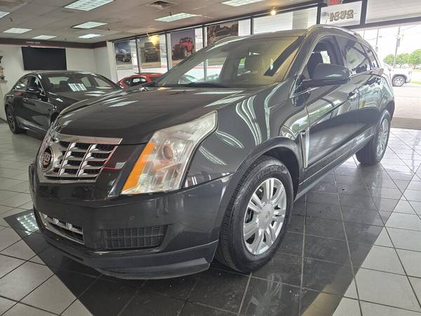 Cadillac SRX with VIN: 3GYFNBE38FS621346