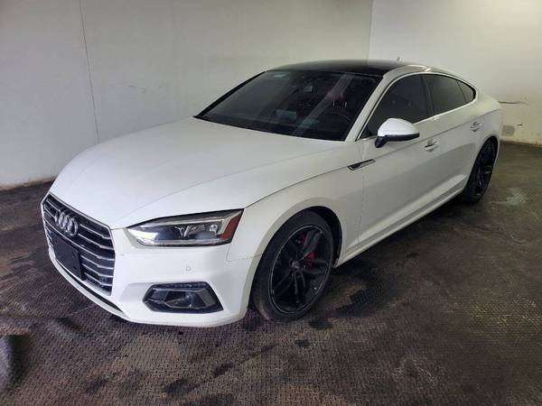Audi A5 with VIN: WAUCNCF53JA034249