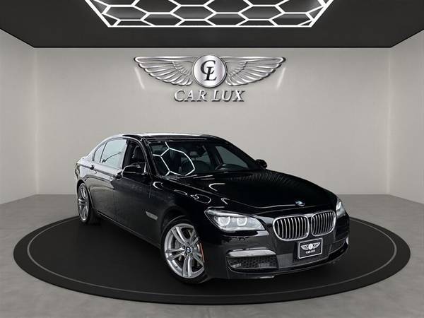 BMW 7 Series with VIN: WBAYE8C50FD782227