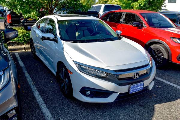 Honda Civic with VIN: 19XFC1F98GE034556