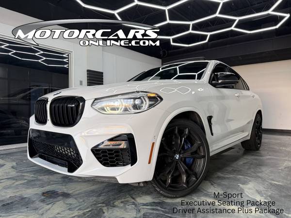 BMW X4 M with VIN: 5YMUJ0C01M9E90650