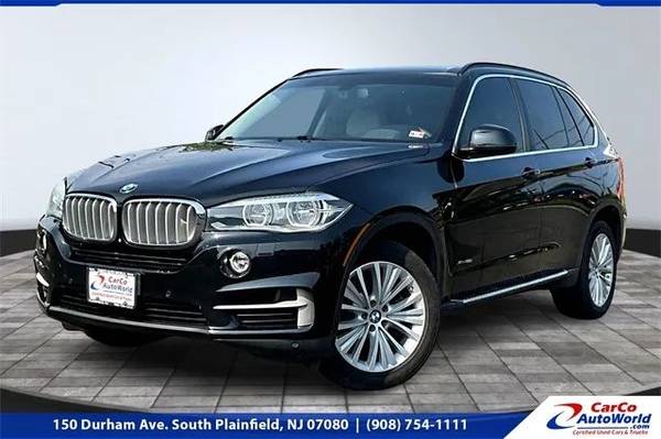 BMW X5 with VIN: 5UXKR6C56E0C02889