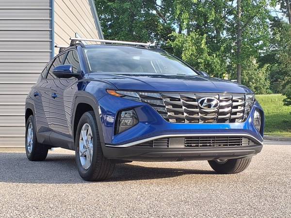 Hyundai Tucson with VIN: 5NMJBCAEXNH122852