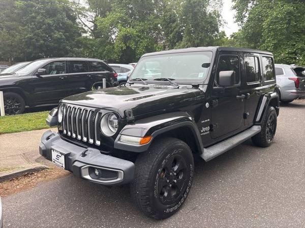 Jeep Wrangler with VIN: 1C4HJXEG4JW132580