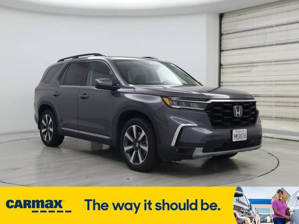 Honda Pilot with VIN: 5FNYG2H7XRB016233