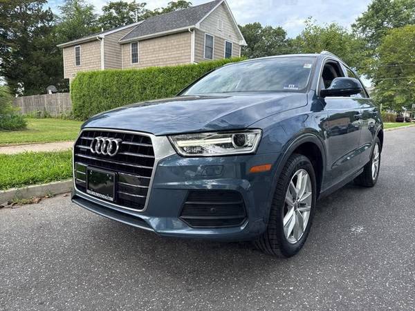 Audi Q3 with VIN: WA1JCCFS6HR002262