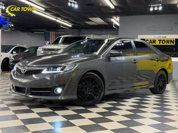 Toyota Camry with VIN: 4T1BK1FKXEU552280